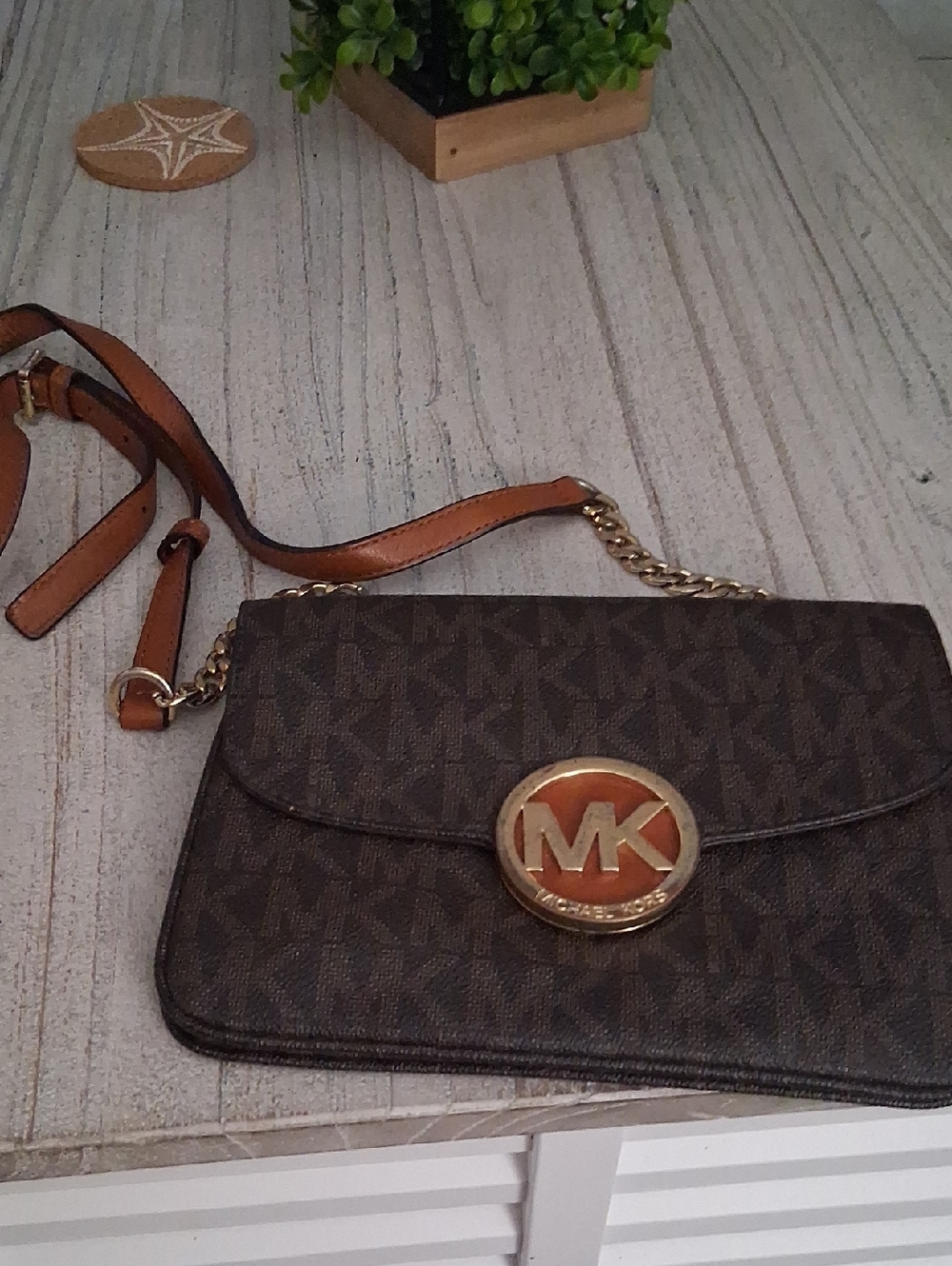 Michael Kors Dark Brown MK Logo Crossbody with Gold-Tone Accent Used Not New.